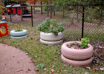different colored tire planters