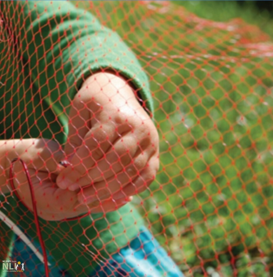 child engaging in fence weaving