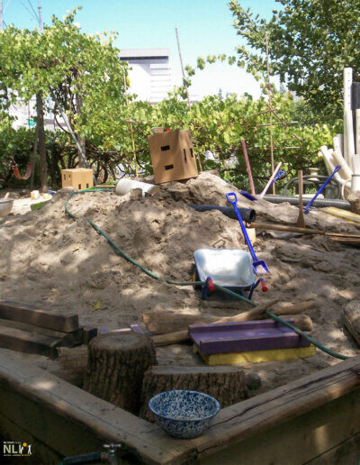 sand play setting with natural and manufactures materials