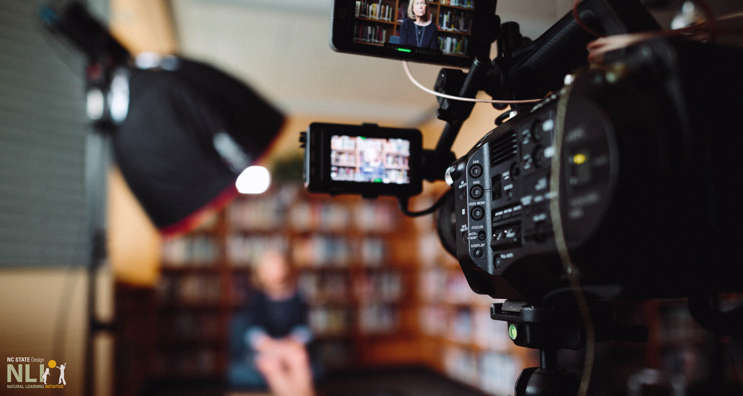 video camera recording an interview