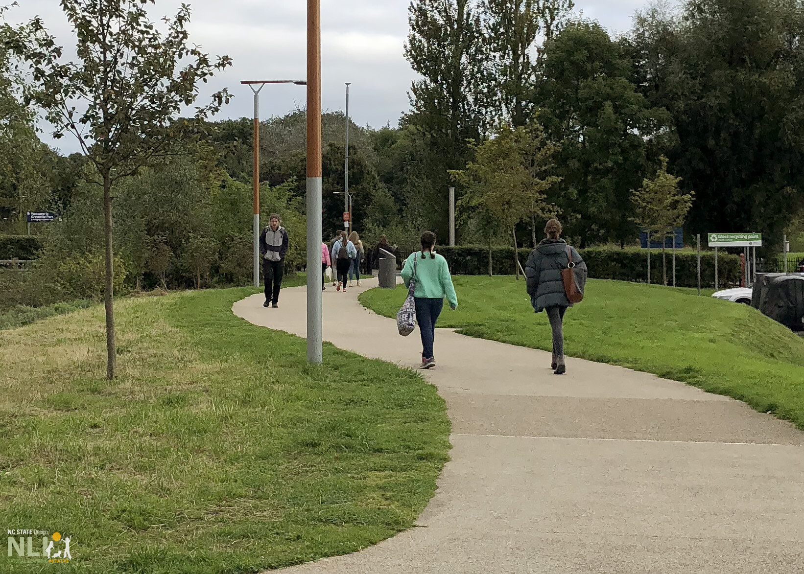 people walking on a pathway