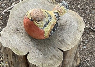Bird Sculpture on log