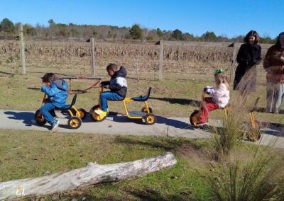 children on wheeled toys