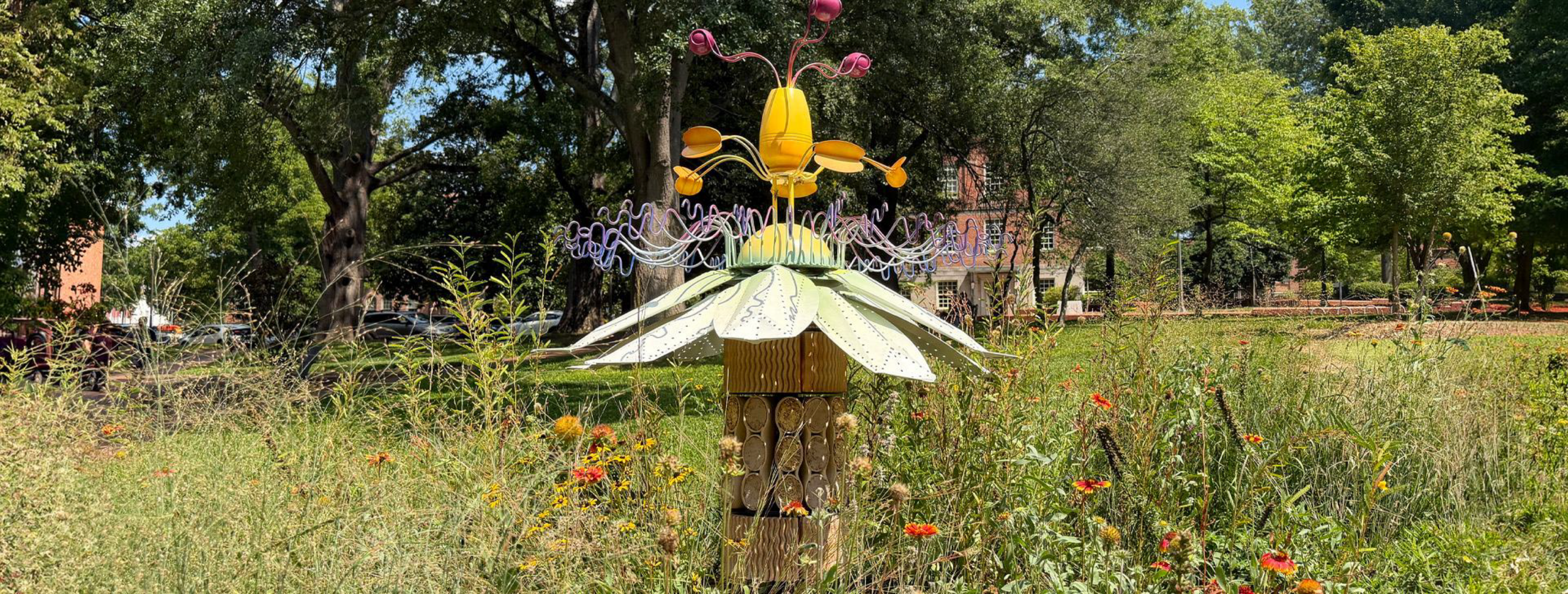 The Bee Vision Bee Hotel in the bright daytime sun.